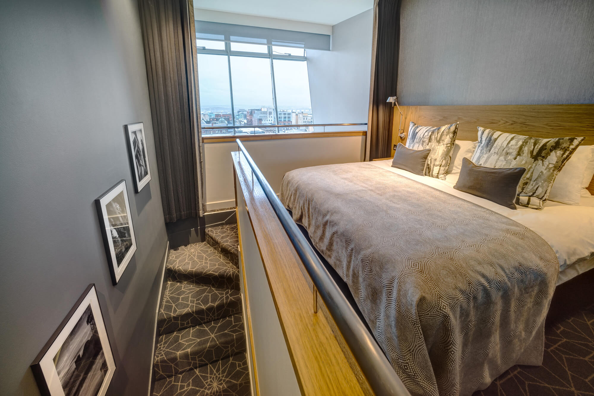 Duplex Suite bedroom upstairs with double bed at Apex City of Glasgow Hotel