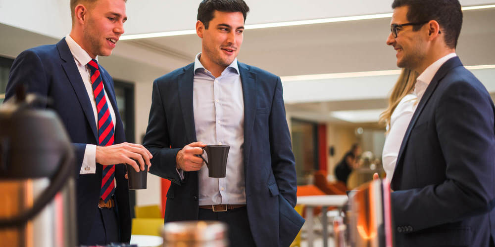 Meet at Apex City Quay Hotel & Spa Colleagues chatting over coffee