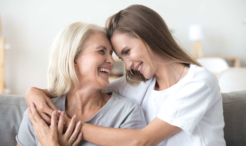 mother and daughter hugging mother and daughter hugging