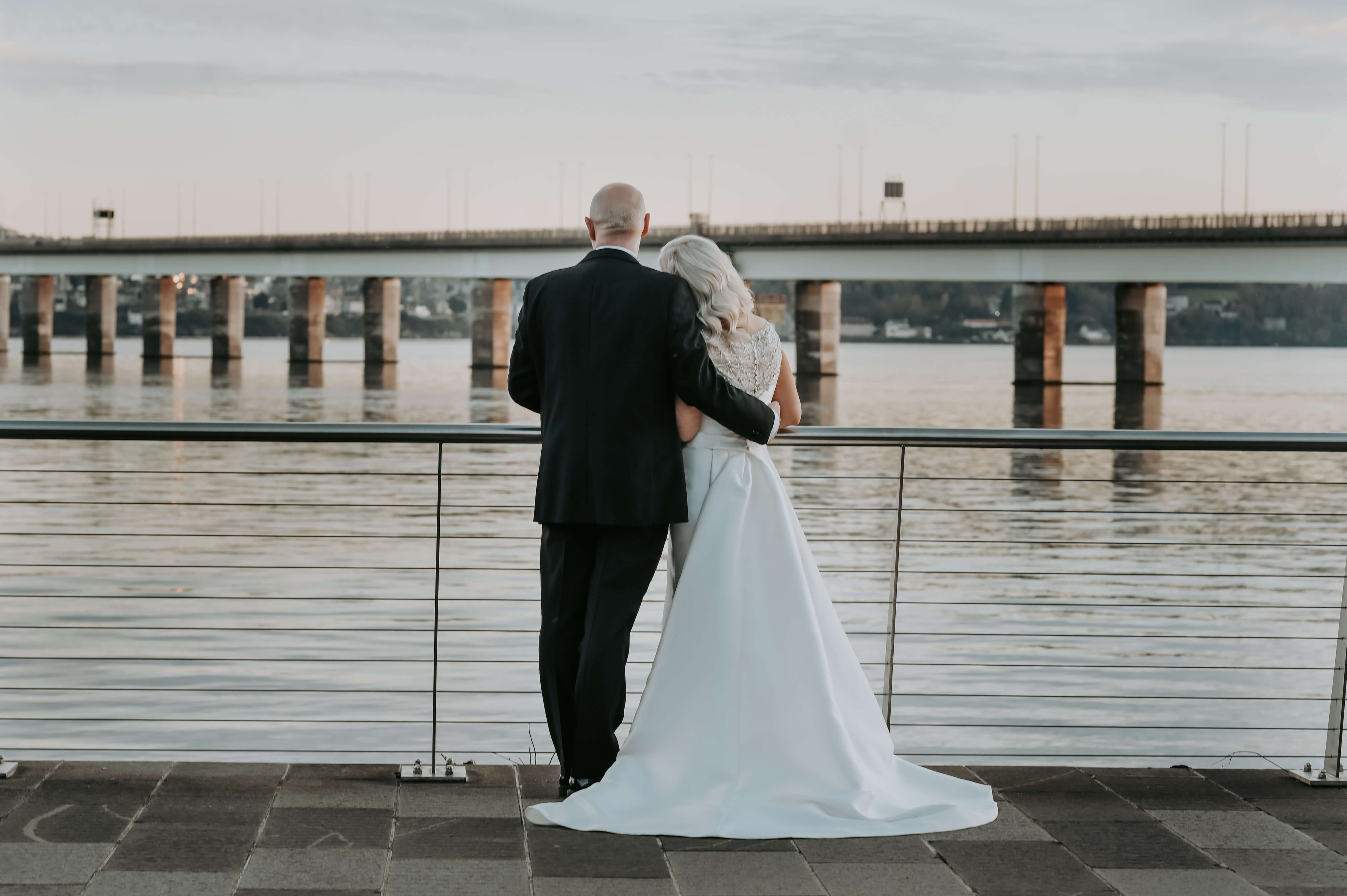 Newly Wed Couple Looking Over River