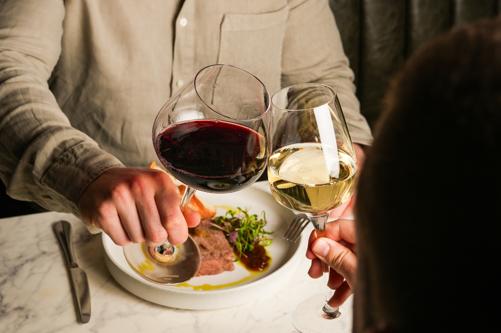 Steak dinner with glass of red wine