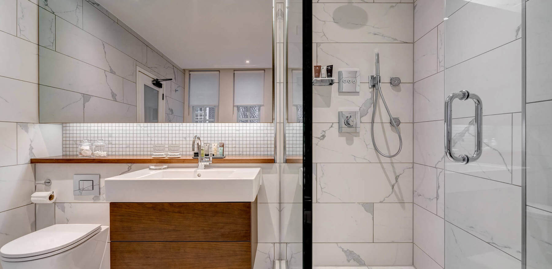 Temple Suite bathroom with walk-in shower at Apex Temple Court Hotel