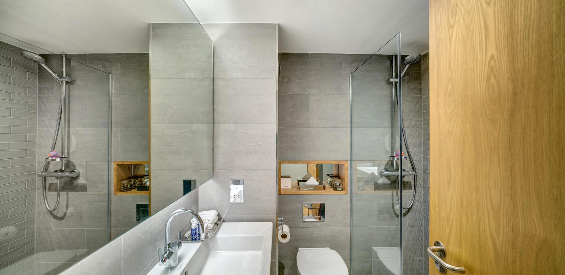 Family Room bathroom with walk-in shower and sink