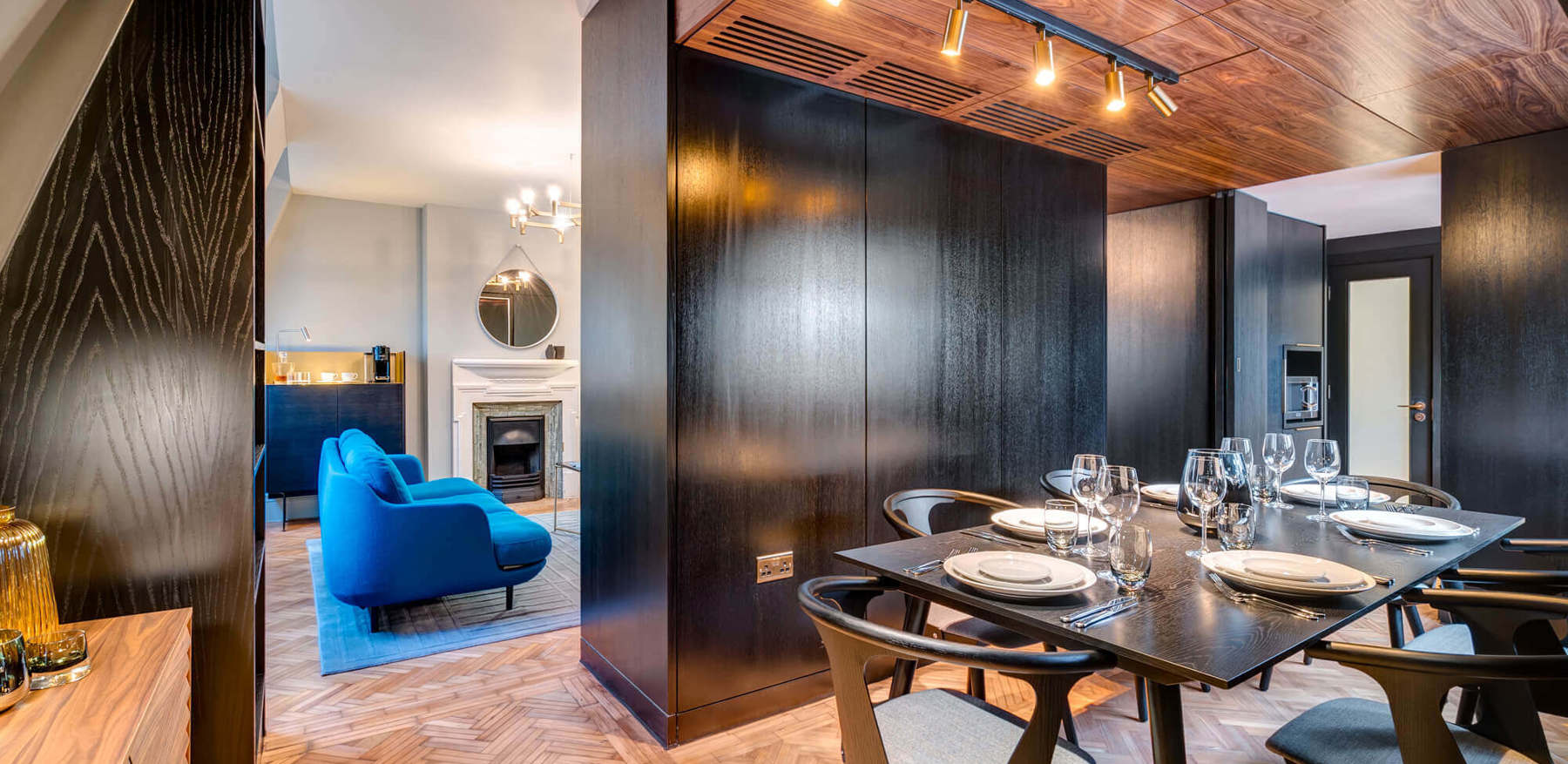 Dining area with table and chairs in Temple Suite at Apex Temple Court Hotel