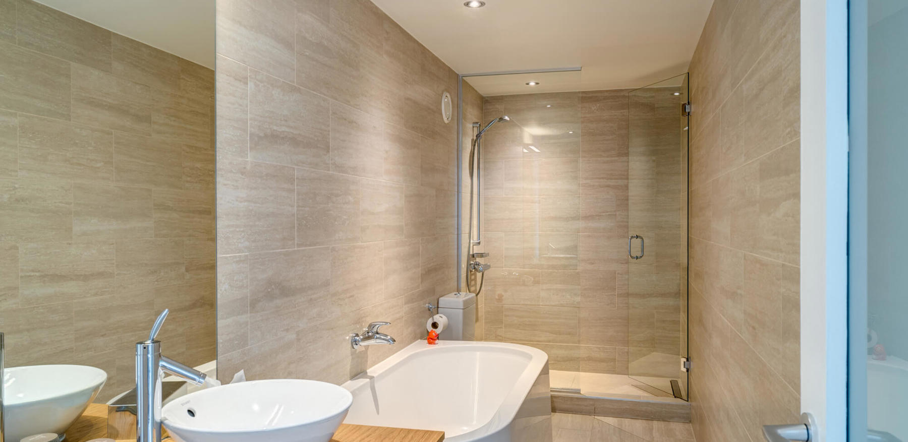 Junior Suite bathroom at Apex City Quay Hotel & Spa Junior Suite bathroom with tub and walk-in shower