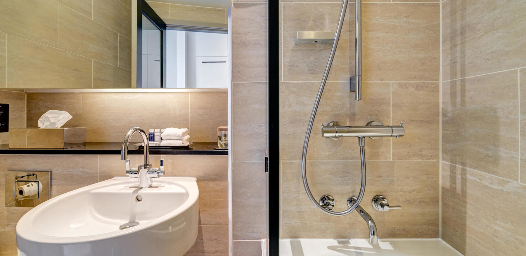 City Room bathroom with shower over bath at Apex Grassmarket Hotel