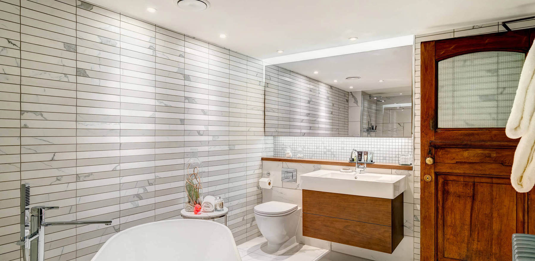 Grand Suite bathroom with freestanding bathtub at Apex Temple Court Hotel