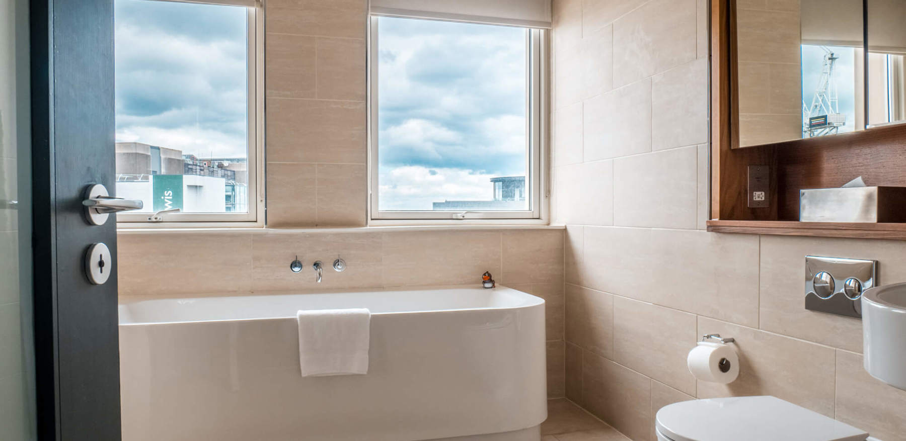 Deluxe Room bathroom at Apex Waterloo Place Hotel Deluxe Room bathroom with freestanding bath at Apex Waterloo Place Hotel