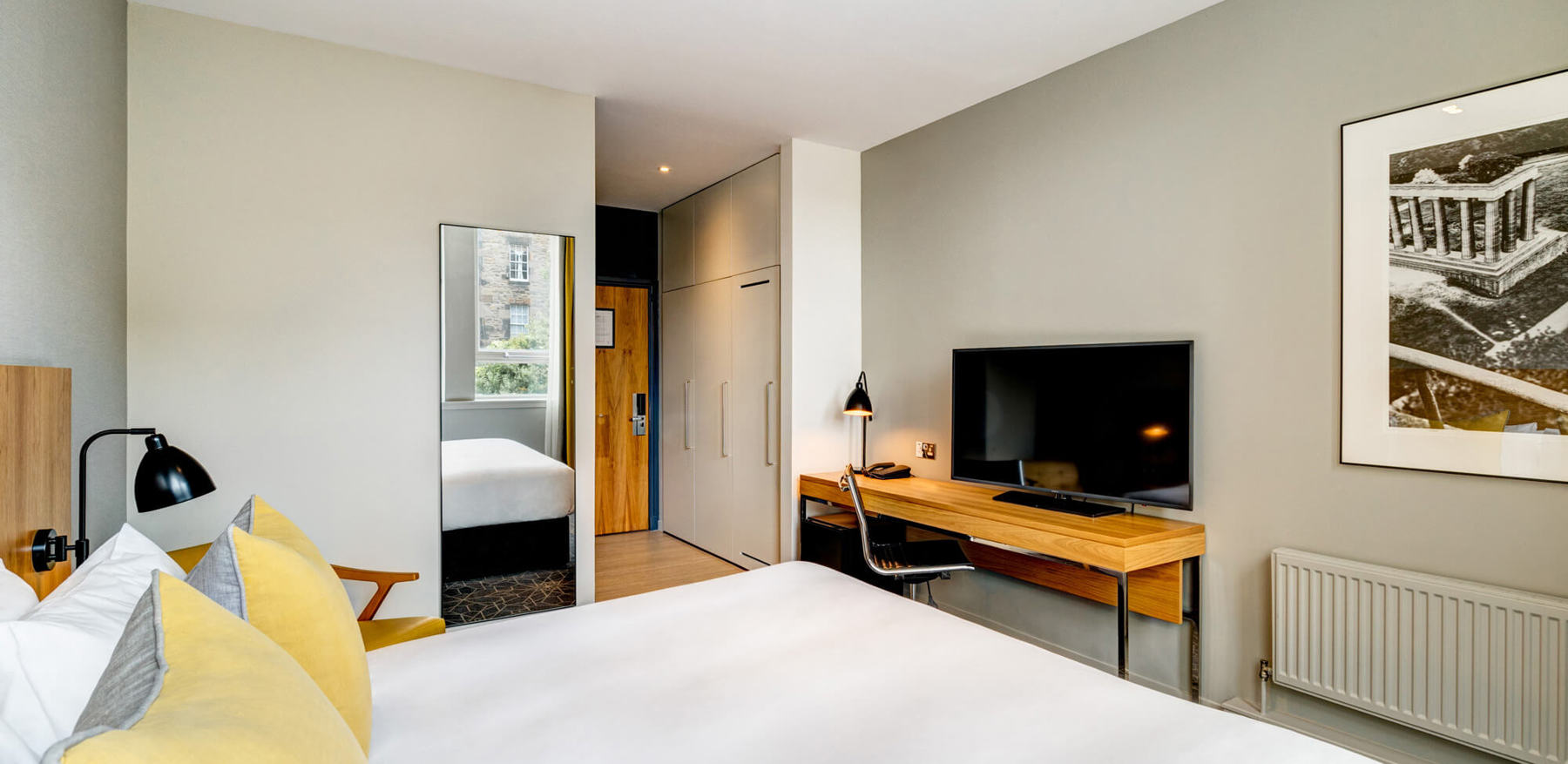 City Room with queen-size bed, desk and TV at Apex Grassmarket Hotel