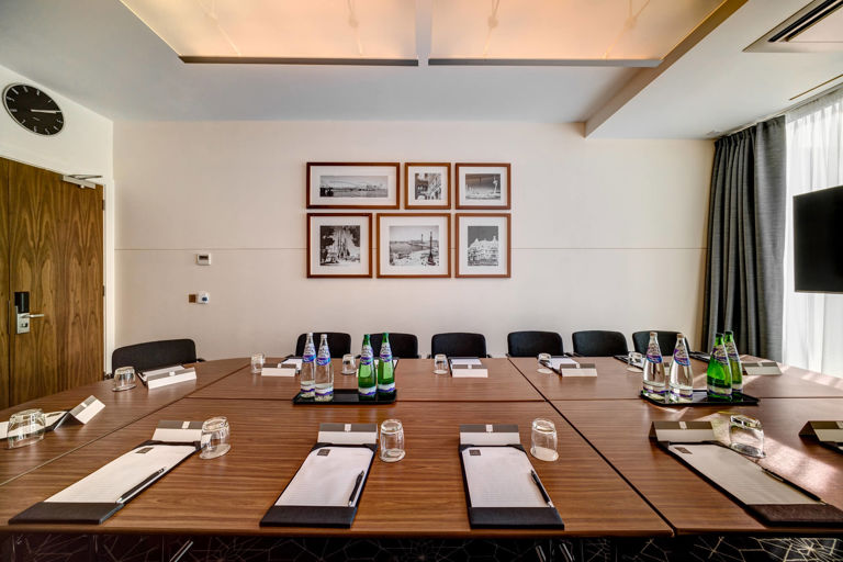 Meeting room set up boardroom style at Apex City Quay Hotel