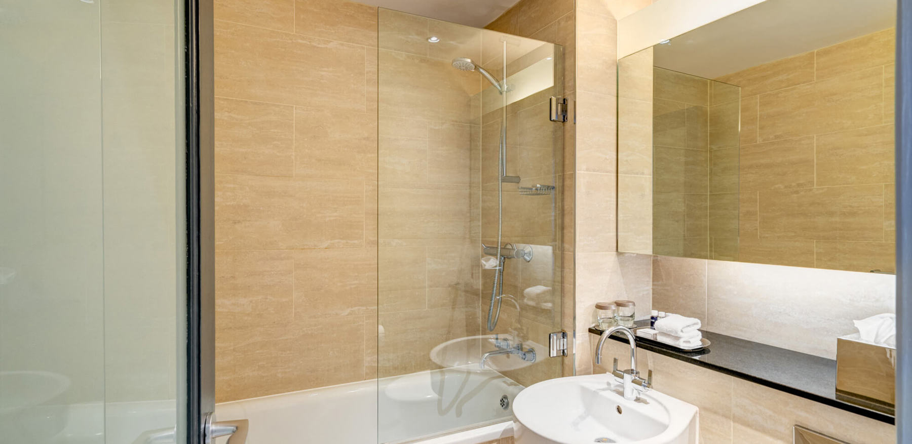 Family Room bathroom with shower over bath at Apex Grassmarket Hotel