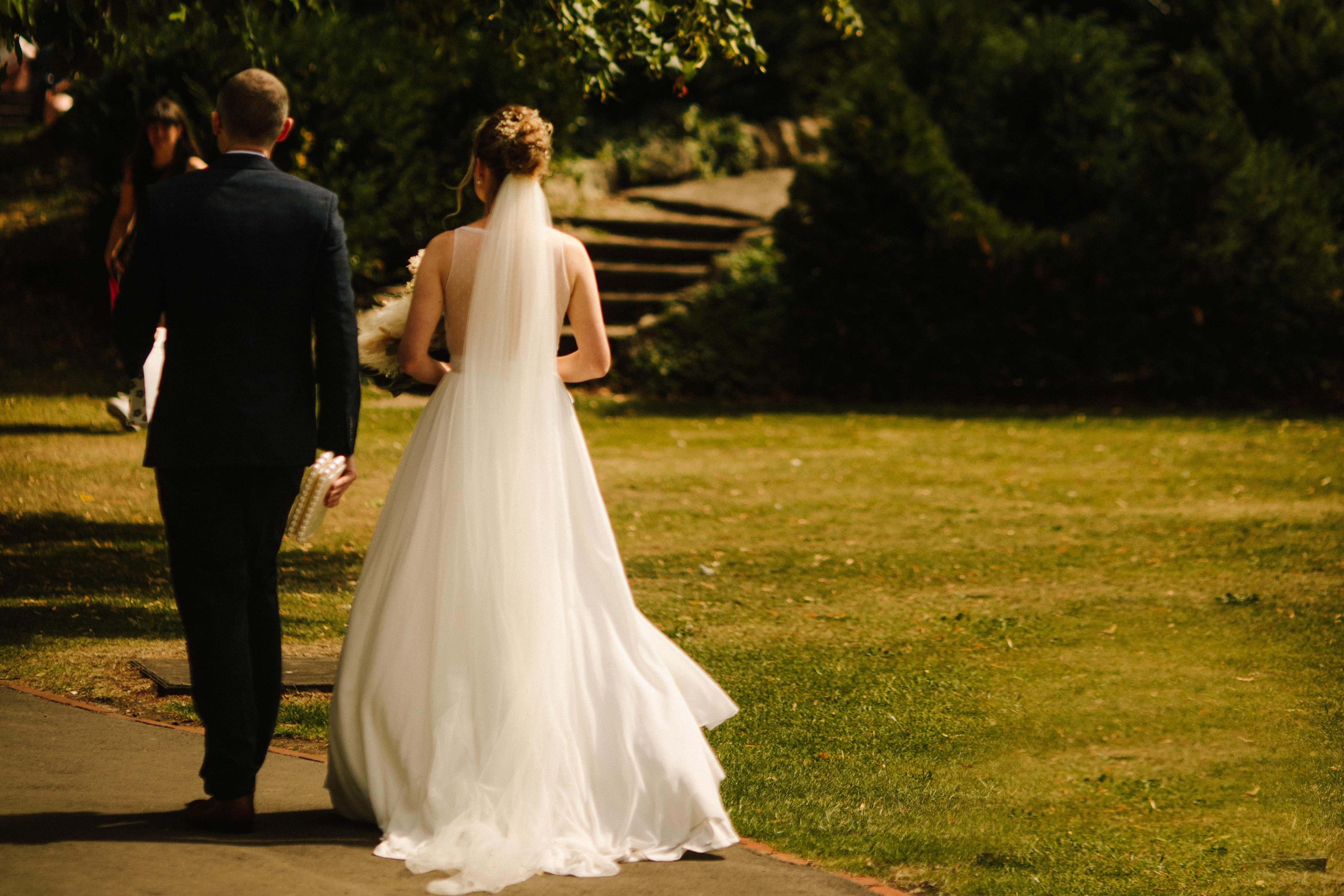 Couple Walking Through The Park