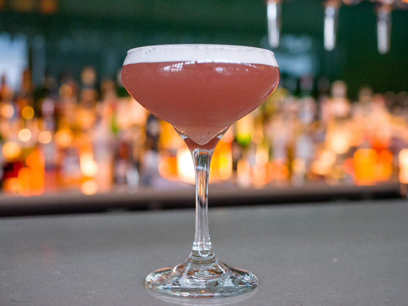 Cocktails at Quayside Bar & Grill Pink martini cocktail on bar at Quayside Bar & Grill