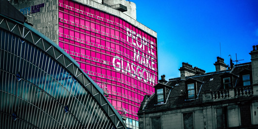 People Make Glasgow sign on side of building