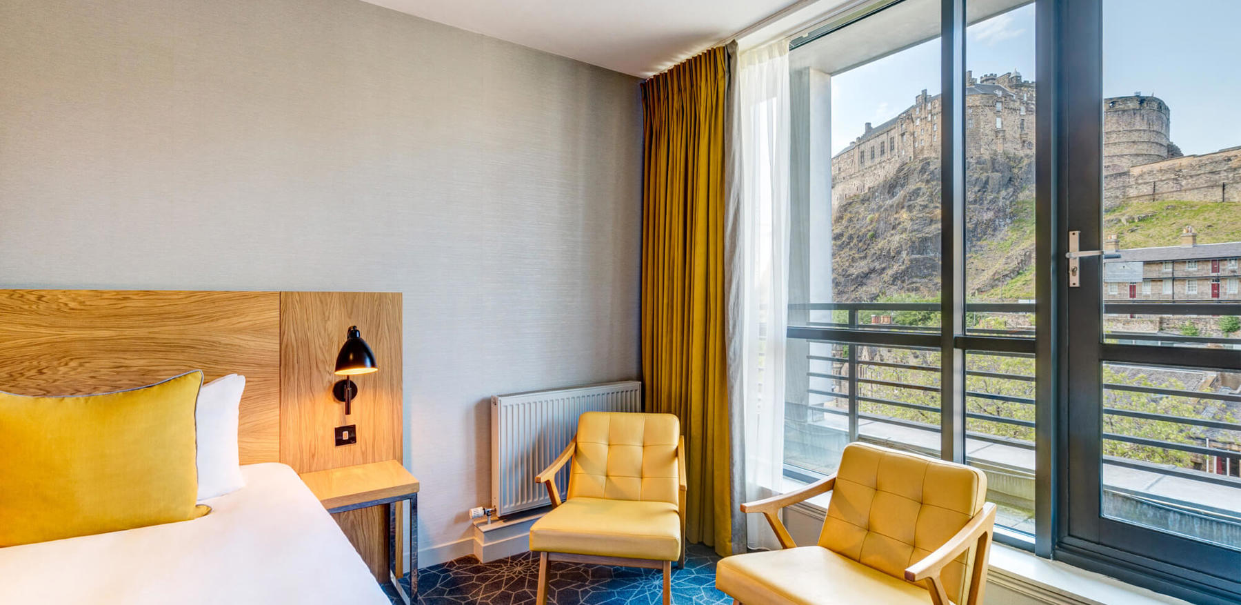Castle View Deluxe Room with Balcony at Apex Grassmarket Hotel Castle View Deluxe Room with Balcony view of Edinburgh Castle at Apex Grassmarket Hotel