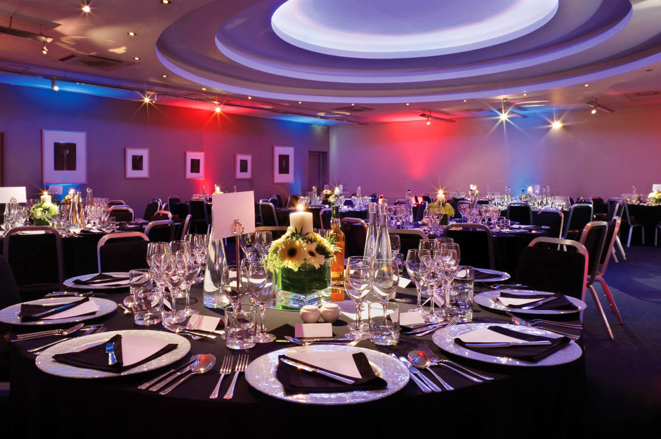 Apex Suite at Apex Grassmarket Hotel Apex Suite set up for private function with table cloths and plates on tables