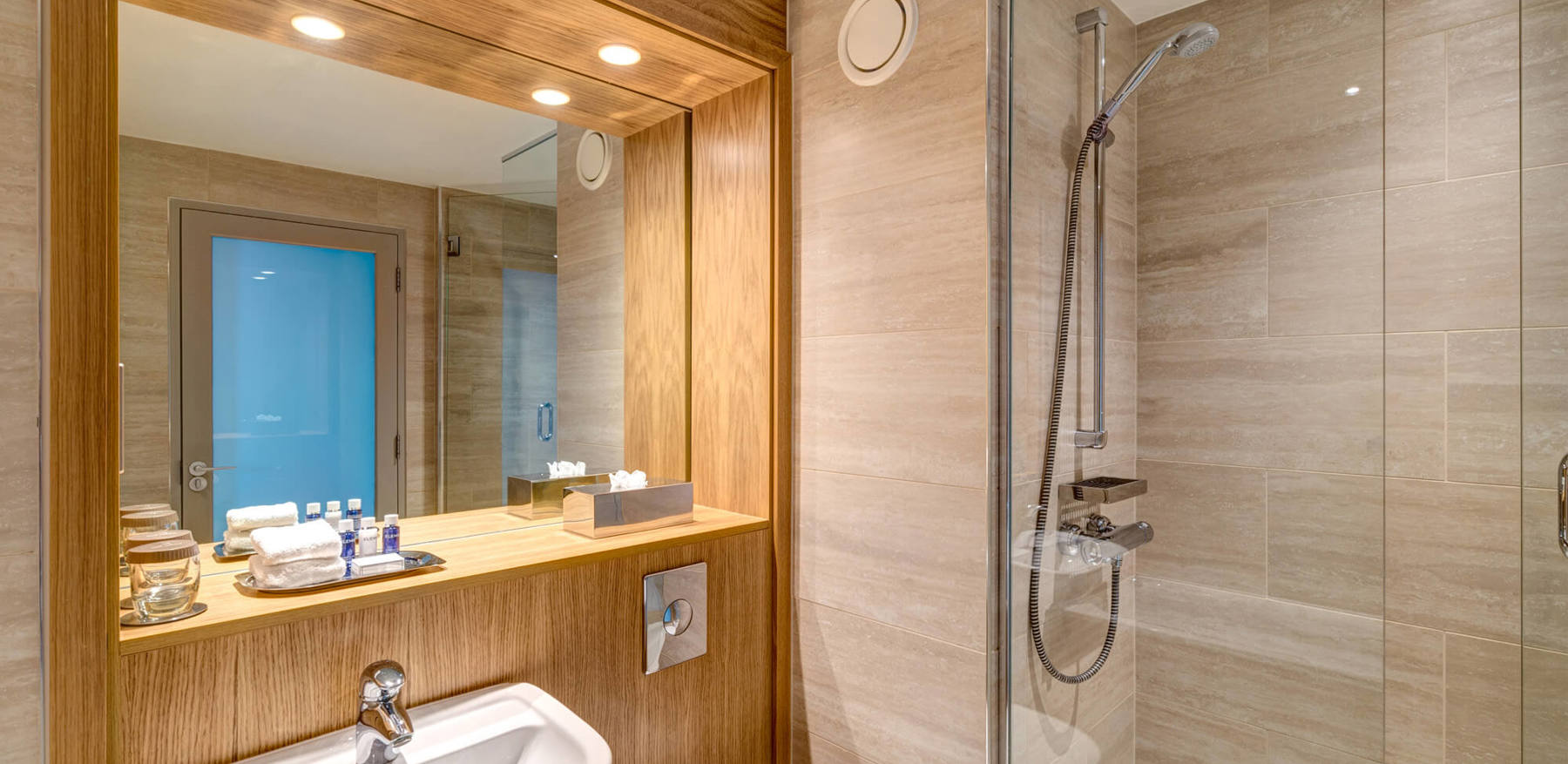 Family Room at Apex City Quay Hotel & Spa Family Room bathroom with walk-in shower at Apex City Quay Hotel & Spa