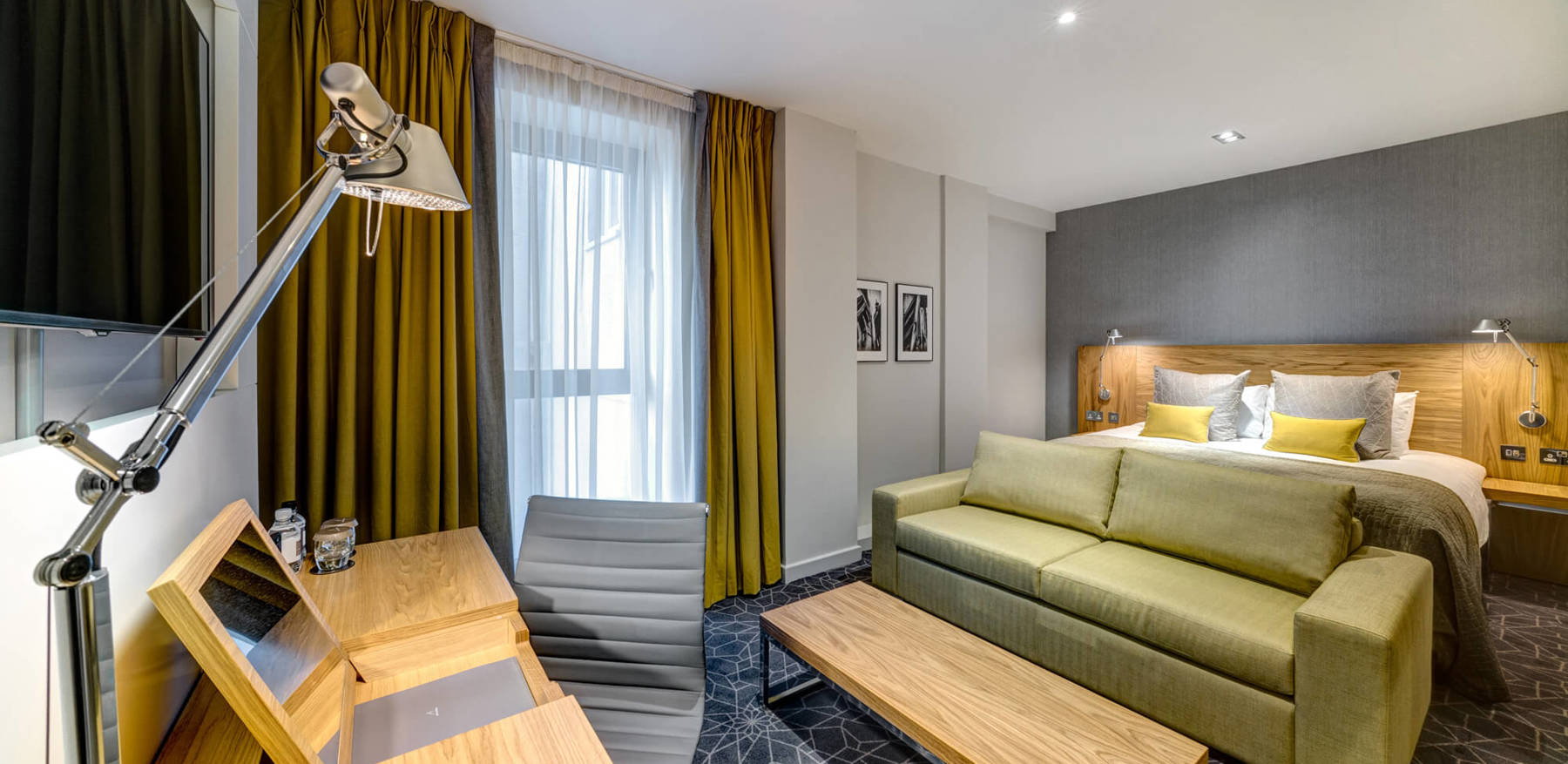 Family Room with bed, sofa-bed and desk with TV