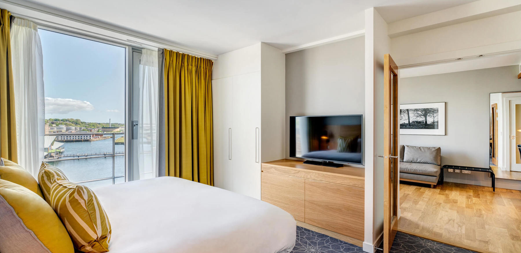 Master Suite bedroom with bed and TV