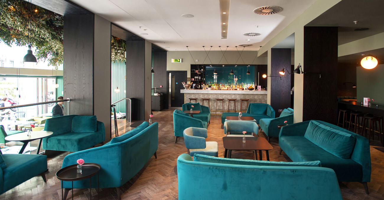 The bar in The Lampery The bar in The Lampery with velvet sofas and parquet flooring