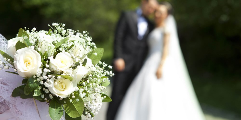 Bride and groom with flowers