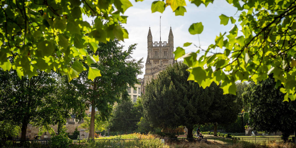 Bath Abbey through trees