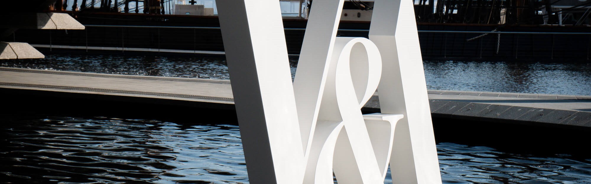 V&A Dundee sign in water